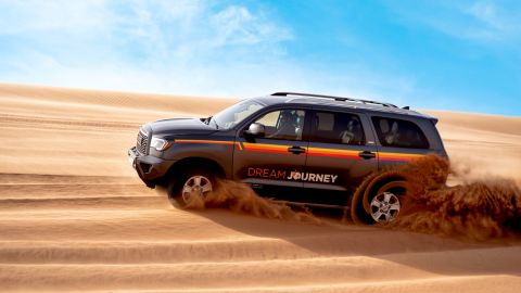 Private Red Dune Desert Safari with Sandboarding & Camel Ride up to 6 guests