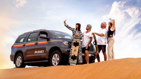 Red Dune Desert Safari with Sandboarding & Camel Ride - Shared Tour