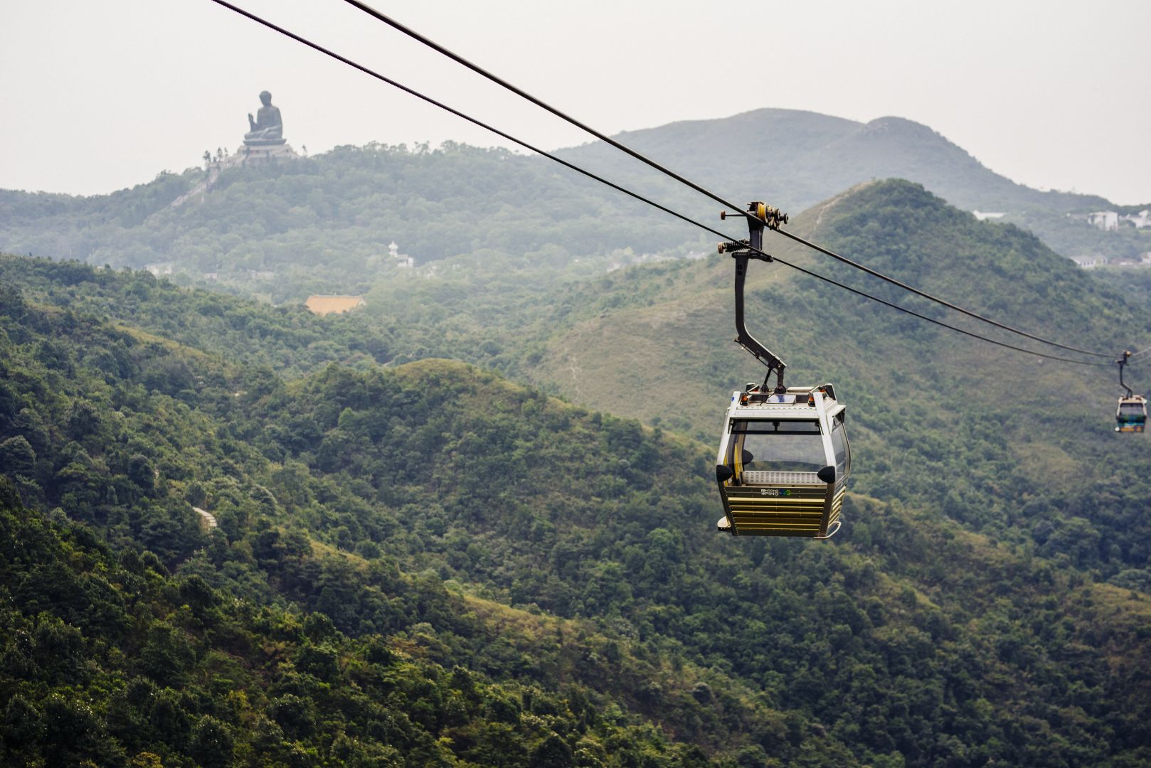 Ngong Ping Cable Car Roundtrip: One-way Standard + One-way Crystal Plus Cabin