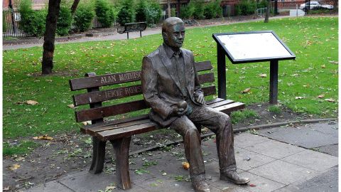 Alan Turing's Manchester: The Hidden Cause