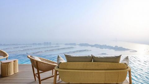 Rise with AURA, Sunrise Pool Experience - Palm View sofa seating
