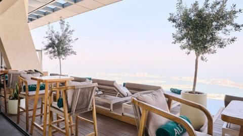 Rise with AURA, Sunrise Pool Experience - Burj View High Table seating 2nd Row