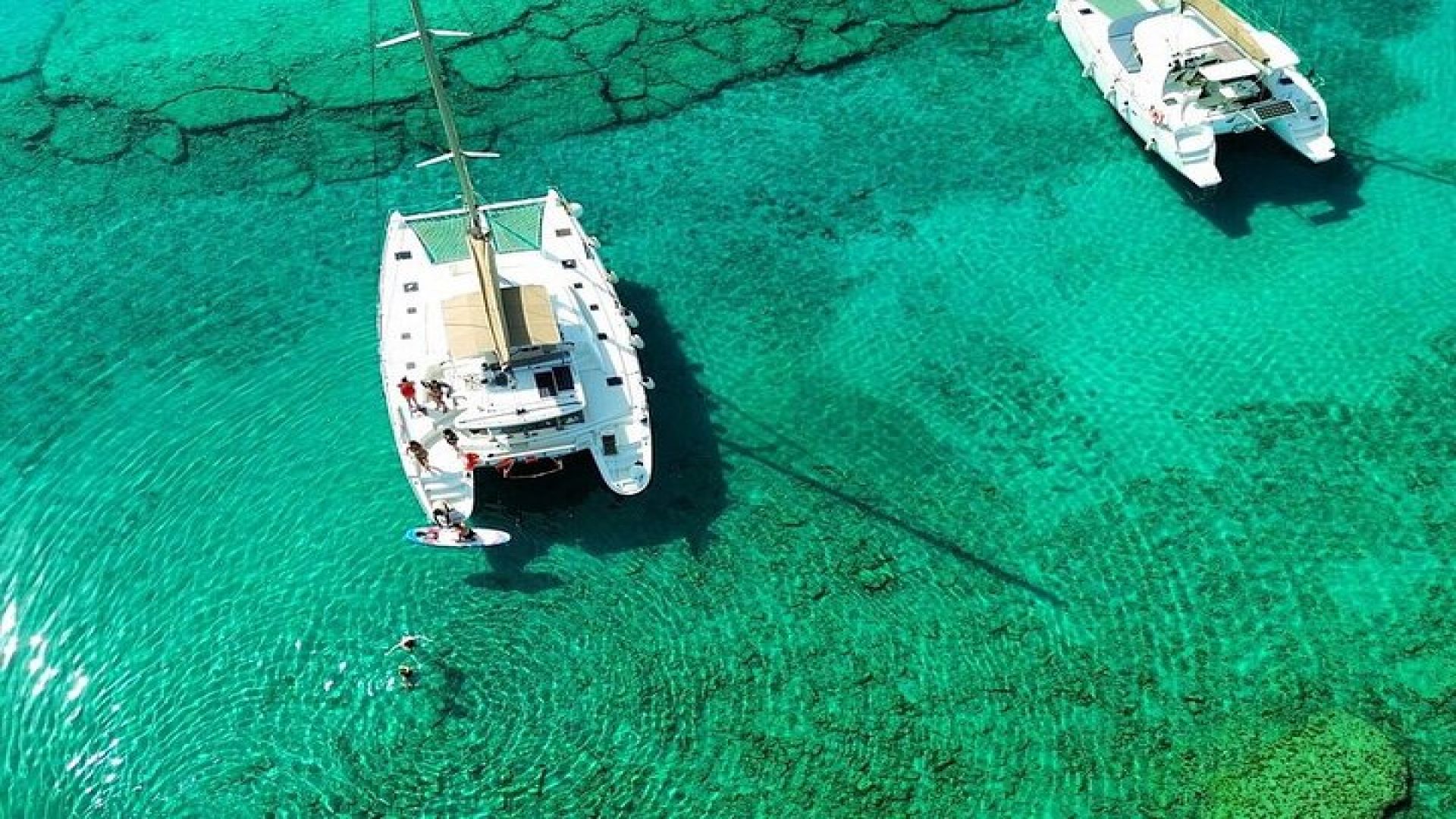 Catamaran Day & Sunset Cruises with meals Drinks and transportation