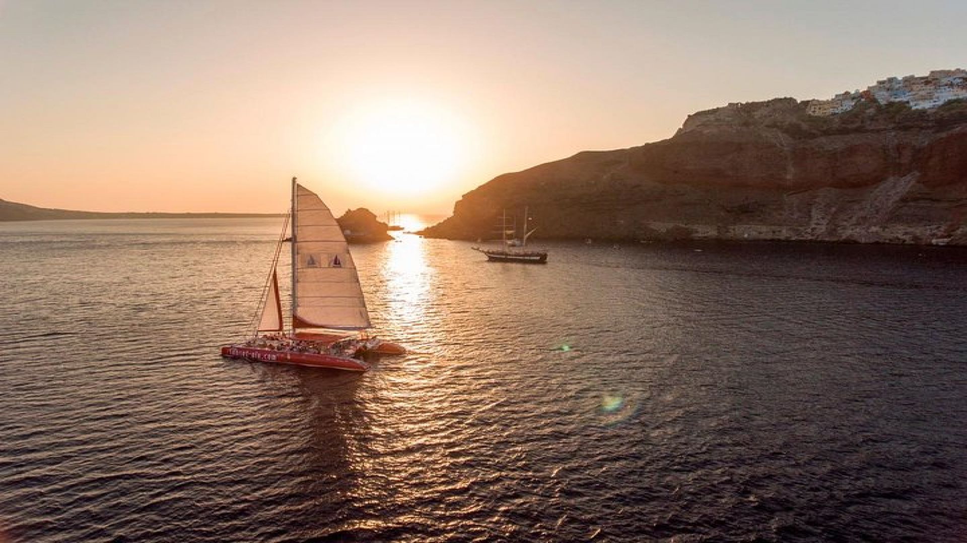 Sunset Sailing Catamaran Cruise in Santorini with BBQ and Drinks