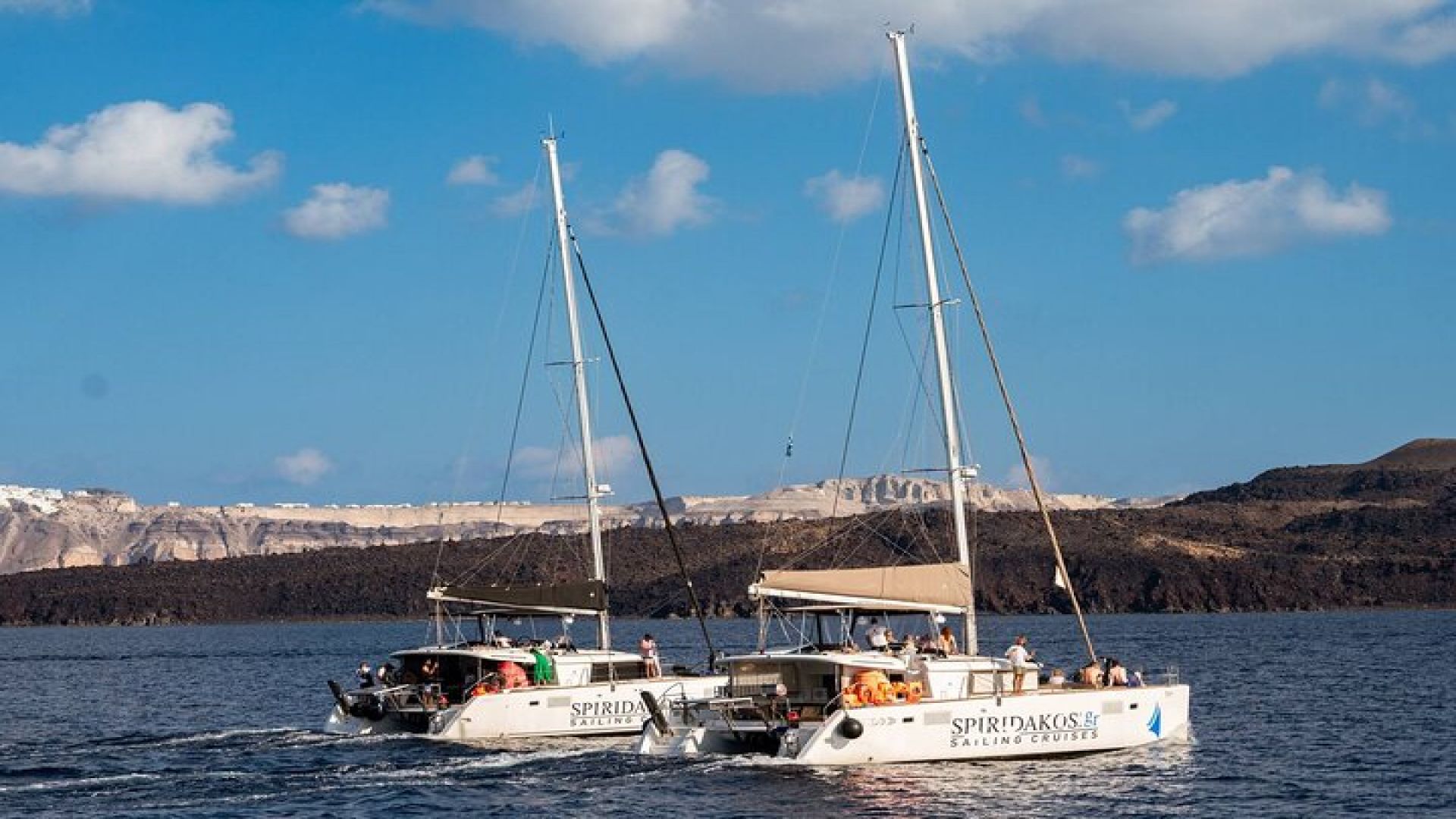 Santorini Classic Catamaran Cruise with BBQ, Drinks and Transfers