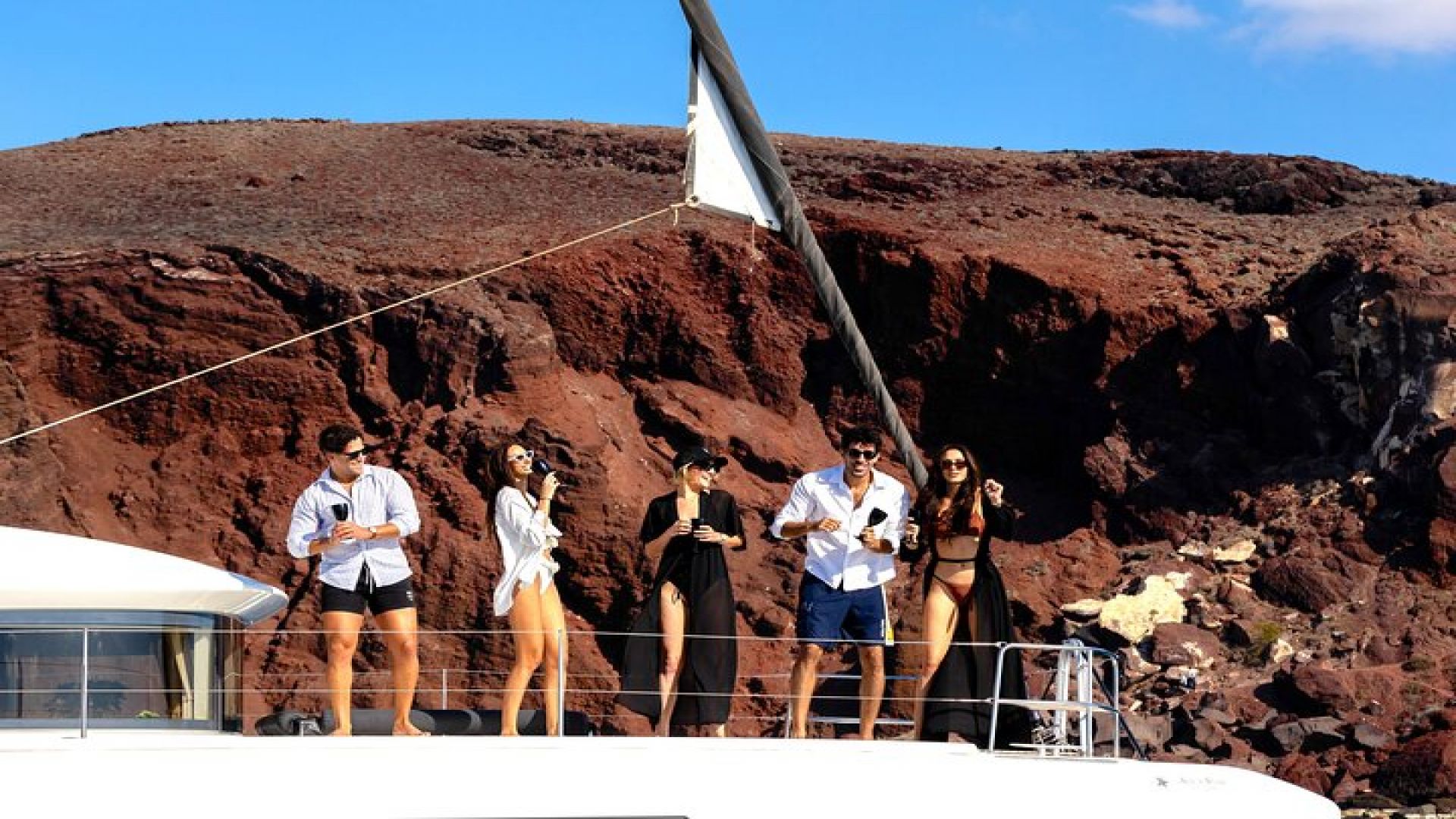Half-Day Exclusive Catamaran Cruise in Santorini with Meal and Open Bar