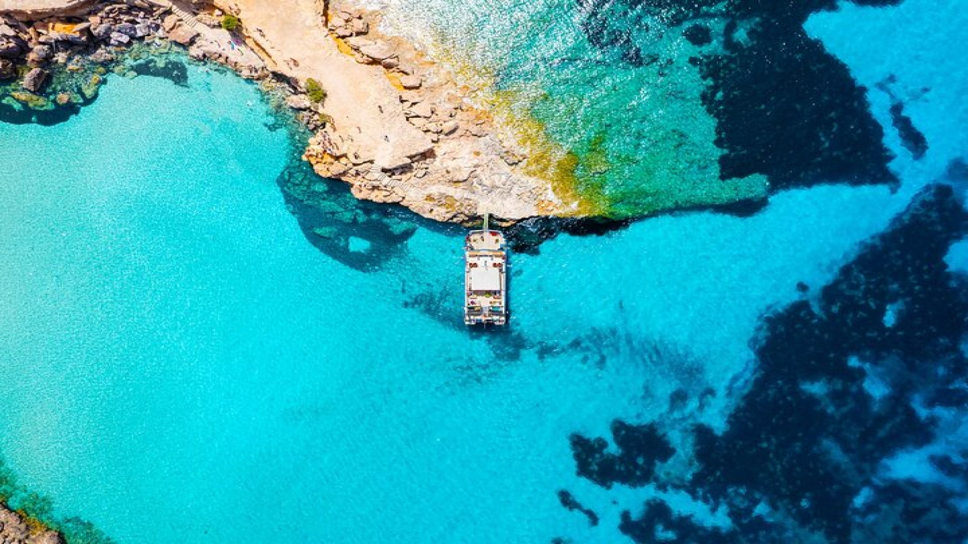 Ibiza Beach Hopping Cruise with Paddleboards, Drinks and Food 6h