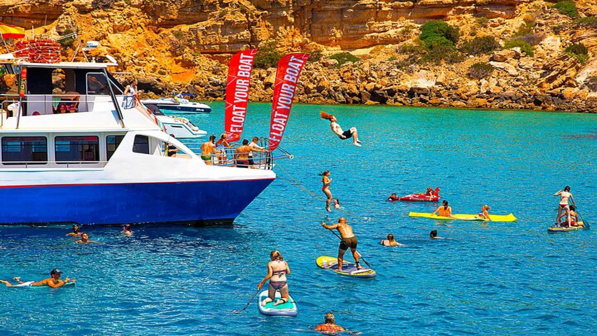 Ibiza Beach Hopping Cruise with Paddleboards, Drinks and Food 6h