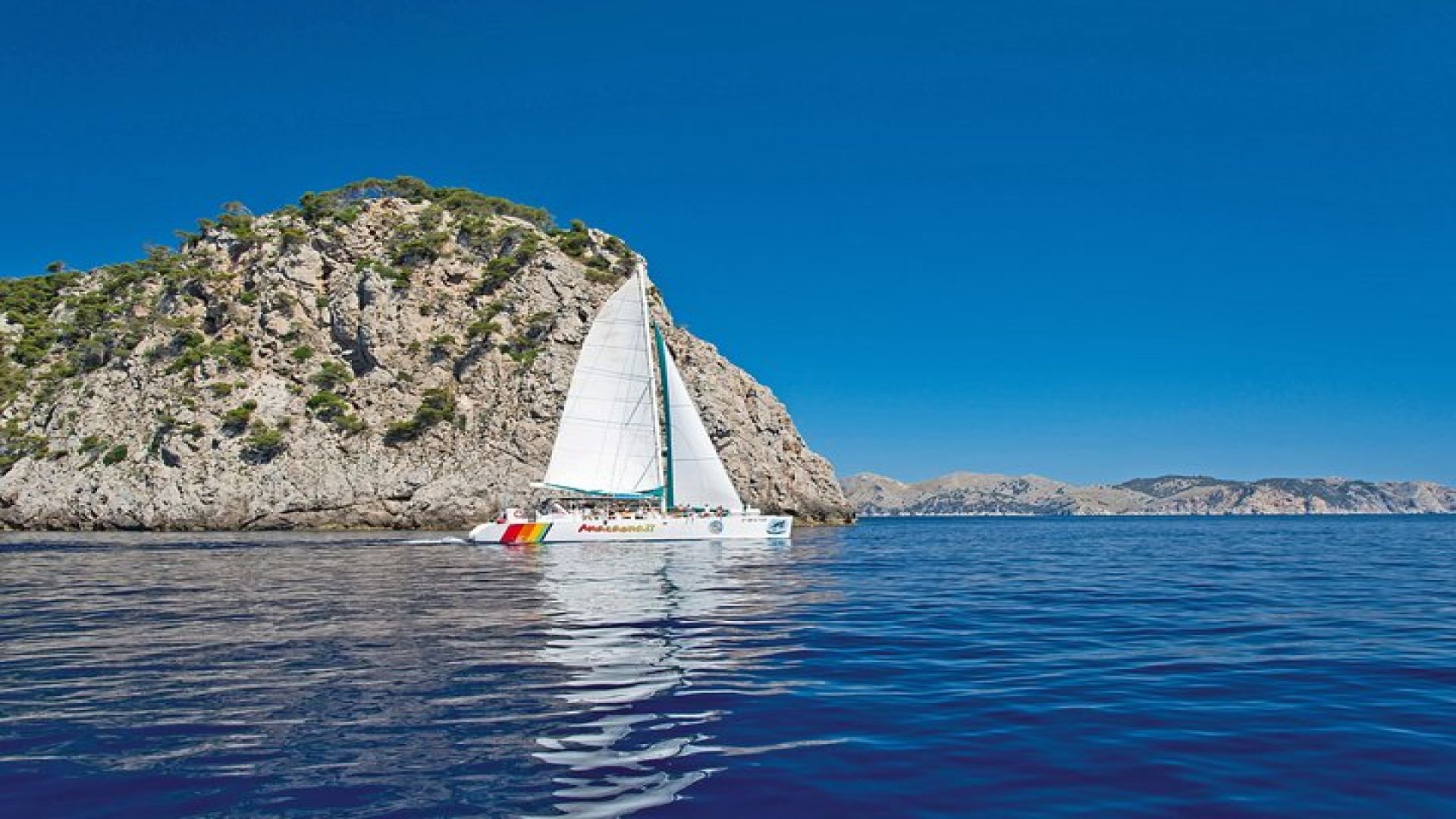 Mallorca Catamaran Cruise with Scenic Views and BBQ Lunch