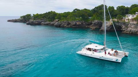 3.5hr Private Catamaran Cruise with Snorkeling, DJ, Bar, Food