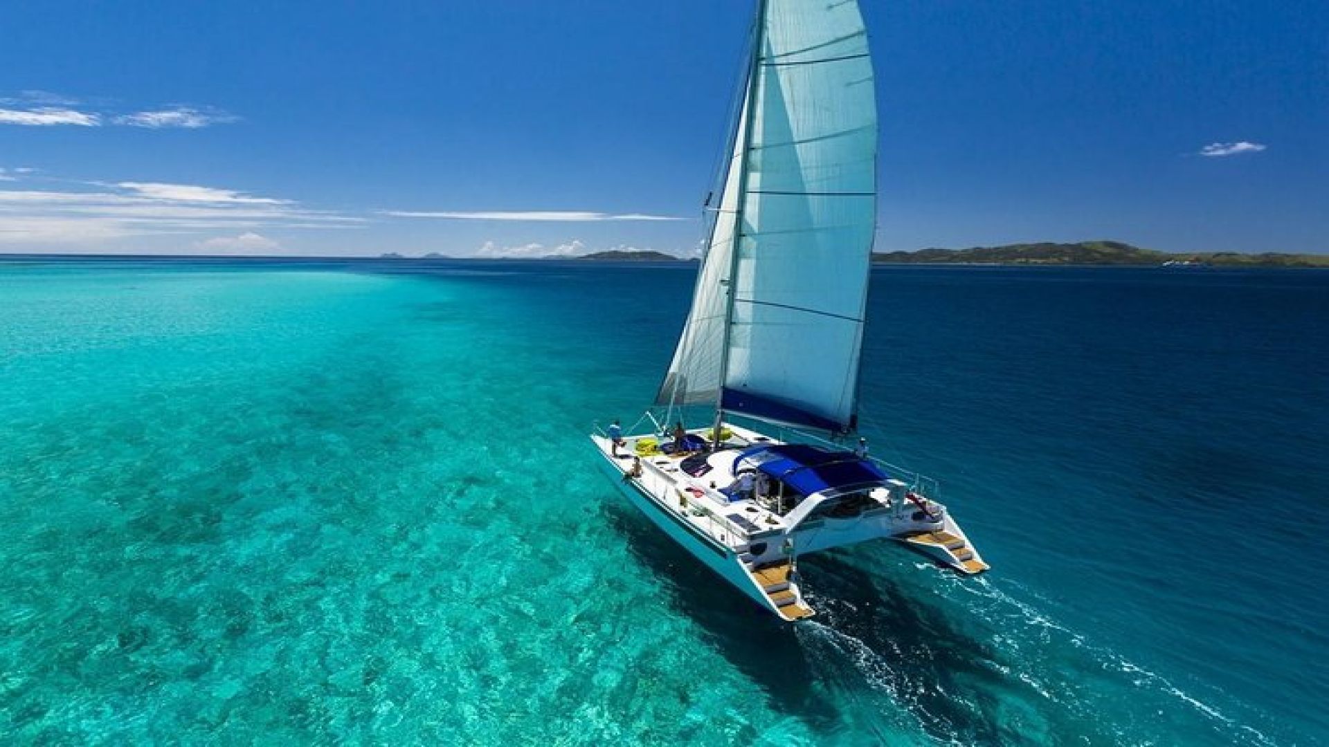 Catamaran adventure to Isla Mujeres with Snorkel,Buffet,Open Bar and Beach Club