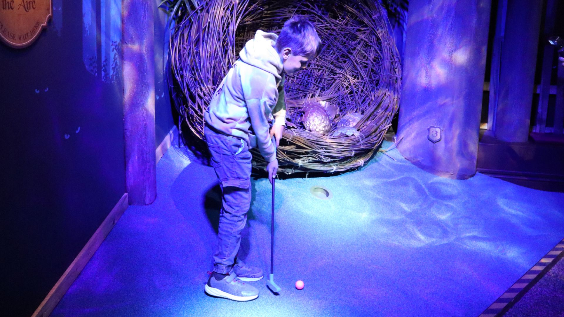 Hole In Wand child putting